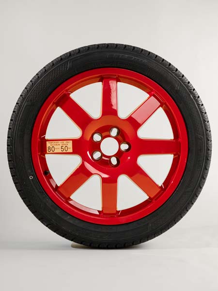 large tesla spare wheel red
